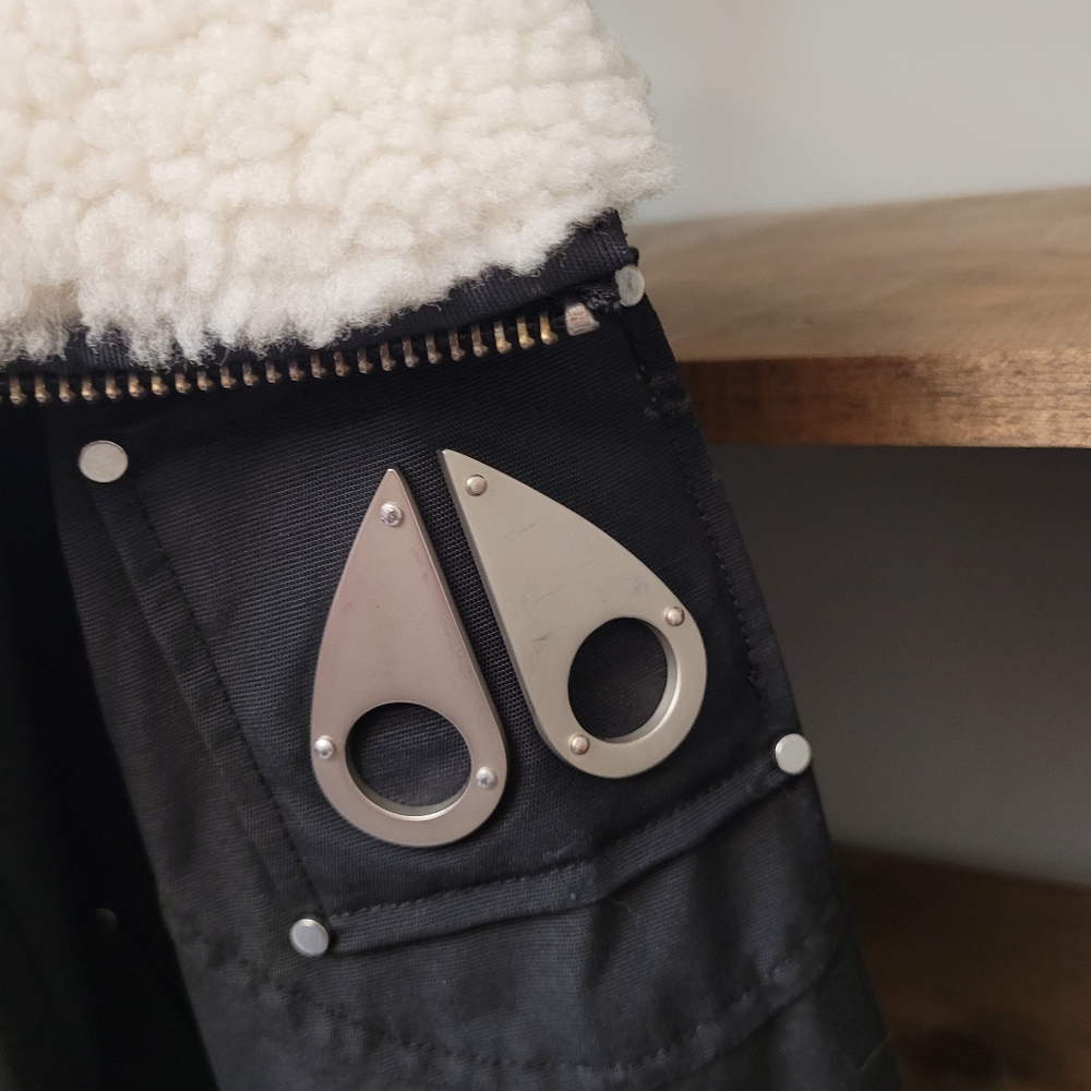 Moose Knuckles Black Jacket with Cream Sherpa Collar and Silver Teardrop Logo
